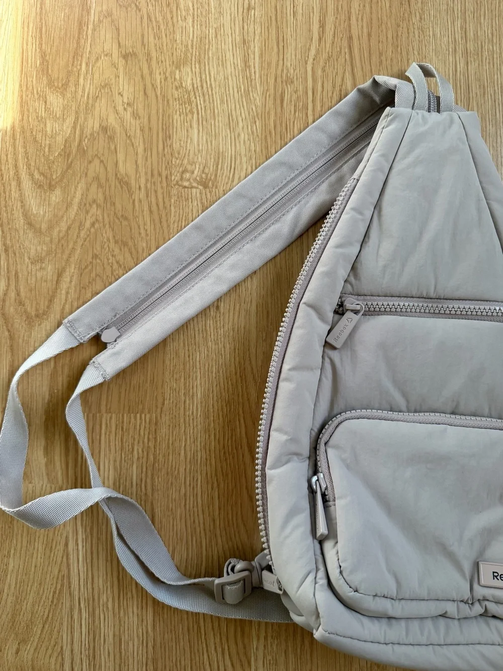 Reebok Women’s Maeve Pale Pink Convertible Crossbody Sling Backpack (Mocha)